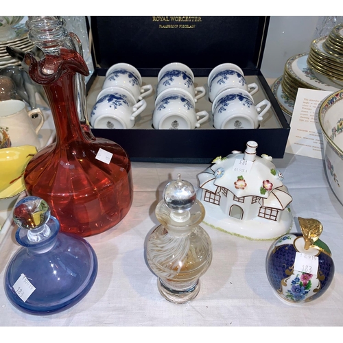 183 - A set of 6 Royal Worcester porcelain chocolate pots and matching tray, boxed. A Cranberry claret jug... 