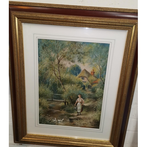 410A - H. S. Percy: A watercolour of a woman feeding ducks with cottage in background, framed and glazed