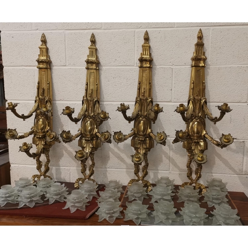 461 - A set of 4 ornate gilt metal 5 branch wall chandeliers on classical column brackets with bow and swa... 