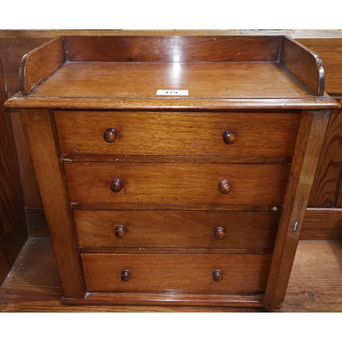 479 - A Victorian collectors' mahogany miniature chest, with ledge back, 4 drawers, hinged locking to one ... 