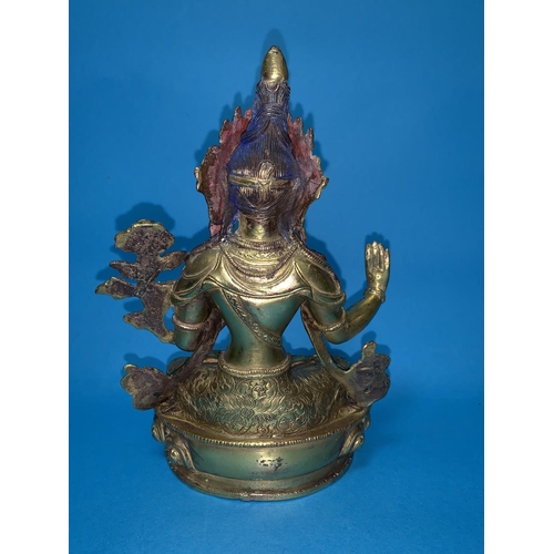 319 - A gilt bronze female buddha sat in meditative pose with mark to base height 21cm