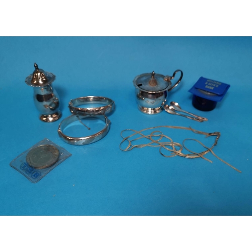 345 - Two silver bangles; an EPNS cruet; etc.