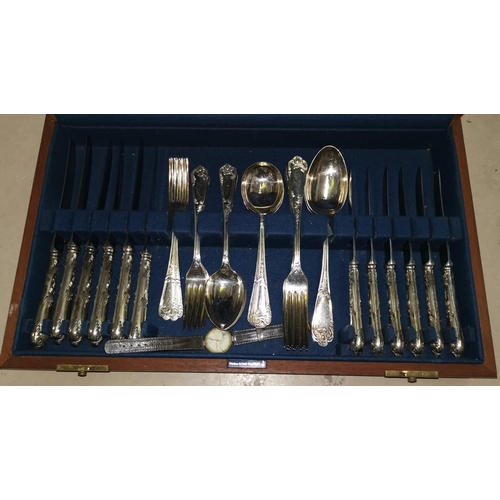 320a - An ornate canteen of silver plated cutlery by Walker & Hall, 6 setting in fitted box; a ladies Tisso... 