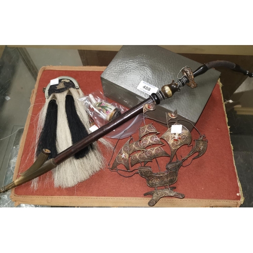 488 - A 19th century sporran; a silver gilt nef; a Black Forest pipe; a pewter cigar box, 21 cm