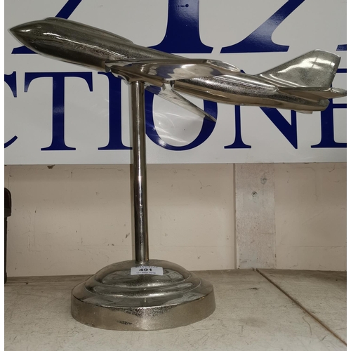 491 - A cast metal jet aircraft on stand, length 43 cm