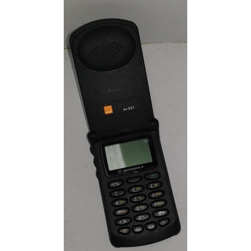 518 - A Motorolla StarTAC flip phone