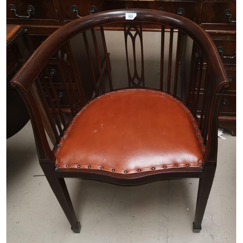 522 - An Edwardian inlaid tub shaped armchair; a pair of cane seat bedroom chairs; a mahogany wine table