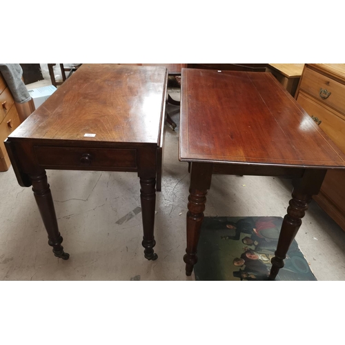 541 - A 19th century mahogany Pembroke table on turned legs and castors; a Victorian mahogany rectangular ... 