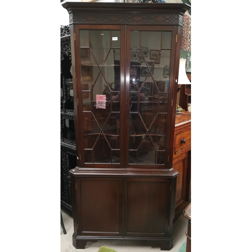 551 - A 19th century mahogany full height corner cupboard, the upper section with moulded cornice, blind f... 