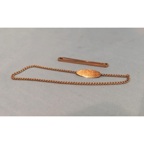 393 - A 9 carat hallmarked gold tie pin and similar tie chain, 4.6gm