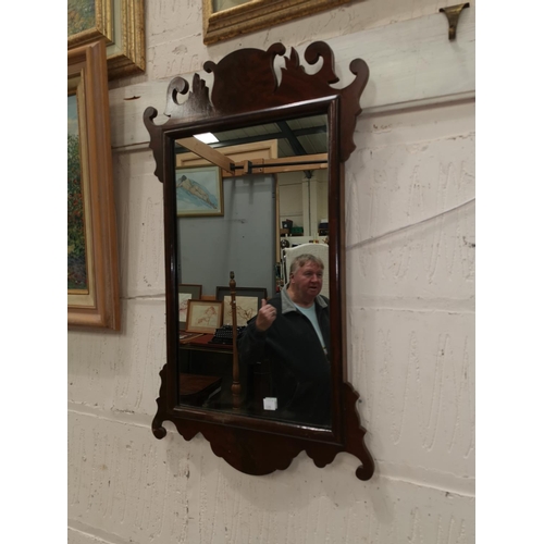 509 - A late 19th/early 20th century wall mirror in Chippendale style fretwork frame