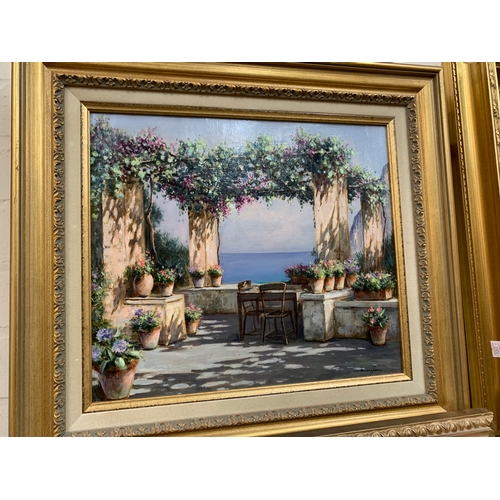 448A - A continental oil on canvas, View from a terrace looking towards the sea, gilt frame, signed with de... 