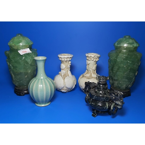 160 - Two oriental lidded green stone ware vases ; a pair of stylised oriental vases and 2 other pieces