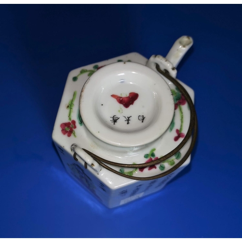 162a - A Chinese porcelain haxagonal shaped tea pot with alternating pictoral decoration and character text