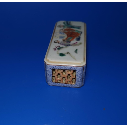 168 - A Chinese porcelain box with pierced decoration to sides, hand painted scene to top and mark to base... 
