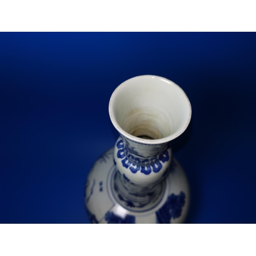 176 - A Chinese blue and white ceramic gourd vase with elongated neck and garlic mouth, decorated with tra... 