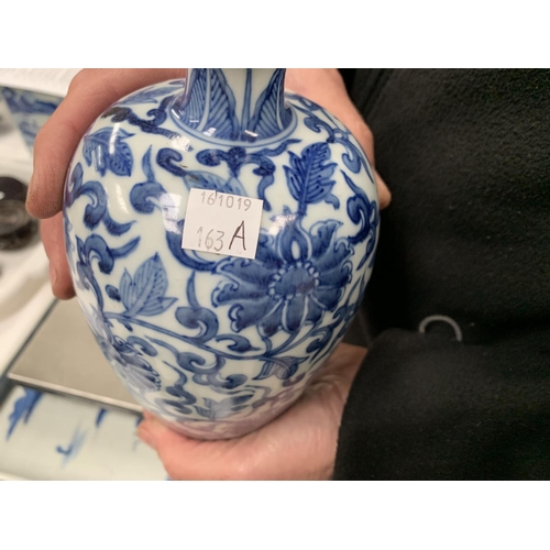 163a - A Chinese blue and white ceramic plum shaped vase with floral decoration, ht 20cm