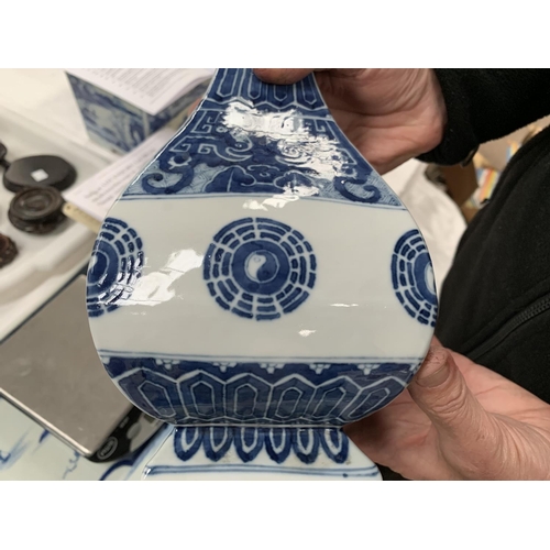 165 - A Chinese ceramic blue and white square vase with waisted neck, ht 28cm