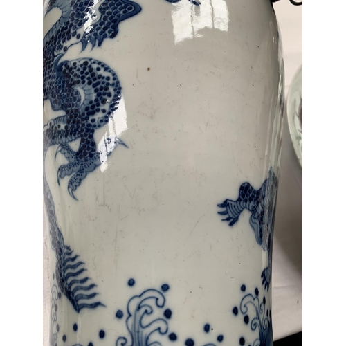 177 - A large Chinese ceramic blue and white plum shape vase decorated with Phoenix and other mystical cre... 
