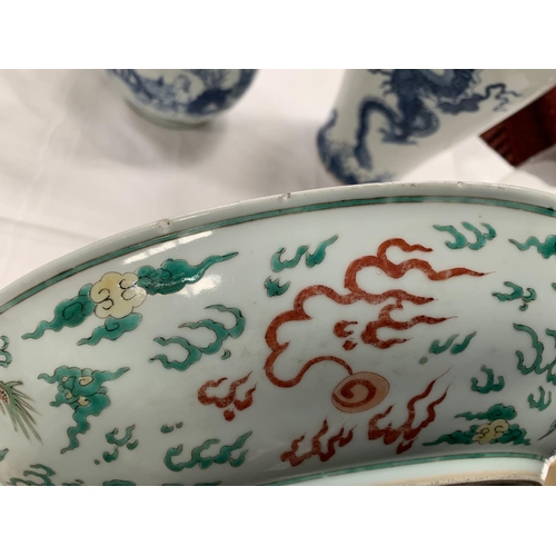 178 - A Chinese Kang Shi period style Famille Verte charger decorated with large dragon to centre with fur... 
