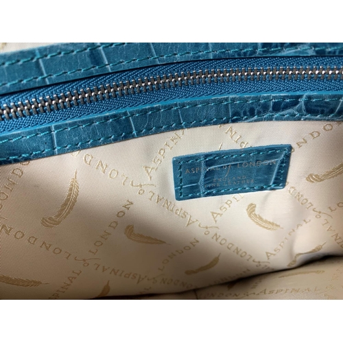 718 - An ASPINAL OF LONDON labelled Hepburn calf hair bag with matching purse and dust bag (worn); 3 handb... 