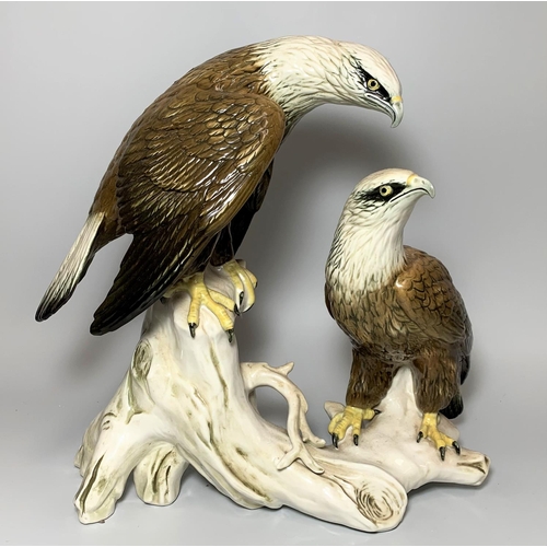 43 - A large continental china group pair of eagles on a branch height 13.5