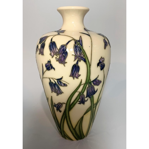 58 - A modern Moorcroft tapering vase decorated with bluebells against a cream ground imp & signed height... 