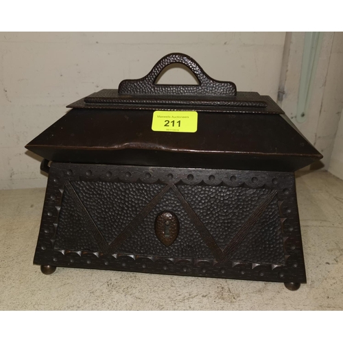 211 - A continental arts and crafts bronze finish iron two handled casket (no key) 25cm