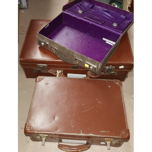 234 - A vintage overnight case and 2 suitcases