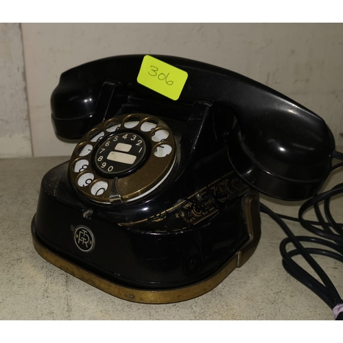 306 - A vintage Japanned metal and brass Bell rotary telephone with Bakelite receiver