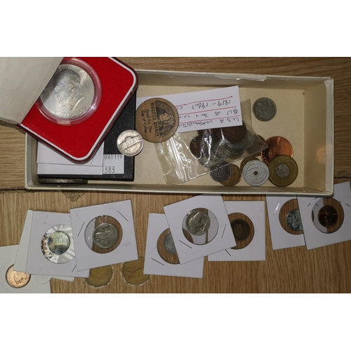 383 - A US silver dollar, another, a Washington medallion, other US coins and tokens