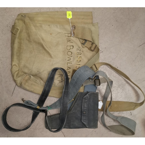 533 - A WWII canvas backpack marked Lt.H.W. Bowland RA and an RAF WWII canvas pistol holder, belt and rifl... 
