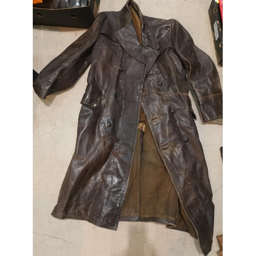 551 - A brown leather great coat of German make