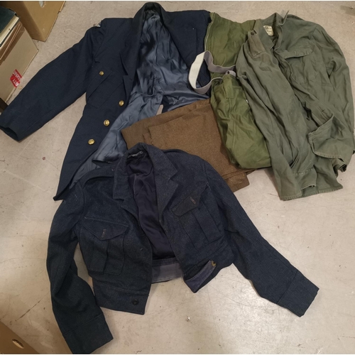 554 - An RAF mechanics jacket and other items of military clothing