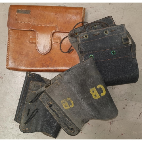 571 - Two pairs of puttees and a leather map case