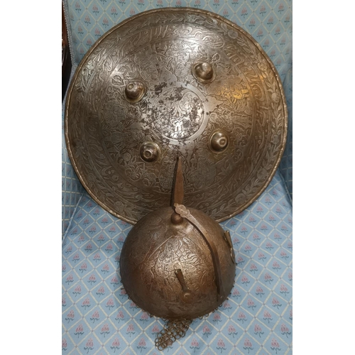 659 - A Middle Eastern engraved Khula Khund type steel helmet with spike abd a similar Dahl type shield, 4... 