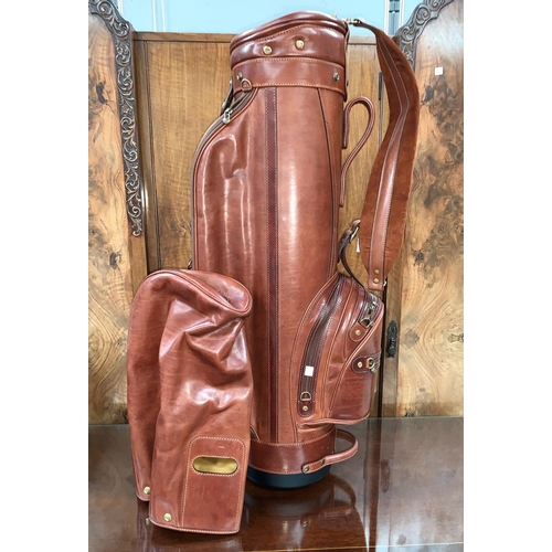 707 - An unused The Bridge golf bag with hood in brown hide, tags still attached.