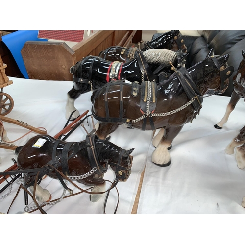 73 - A large Melbaware shire horse with tack; 5 similar horses 1 with plough