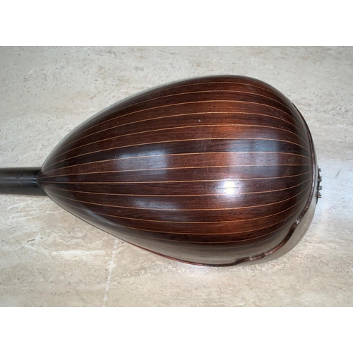 673 - a Greek inlaid mandolin in case