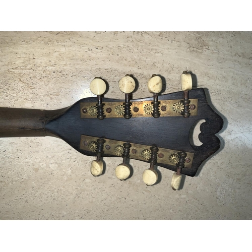 673 - a Greek inlaid mandolin in case