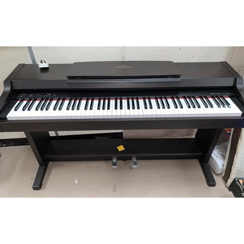 674 - A Yamaha Clavinova CLP - 153SG electronic piano with instructions in dark wood effect case
