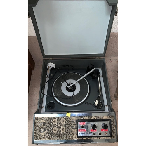 676 - A 1960's Ferguson portable record player, sold as a collector's item only
