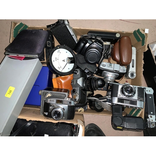 735 - A selection of 35mm cameras, various meters etc