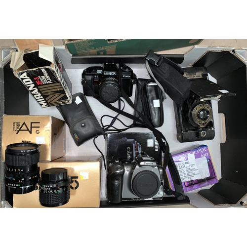 764 - A NIKON F55 camera, a 28-100mm lens and other photographic equipment