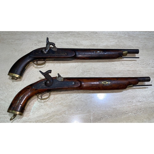 525 - A near matching pair of East India Company type long barrel brass mounted percussion cap pistols imp... 