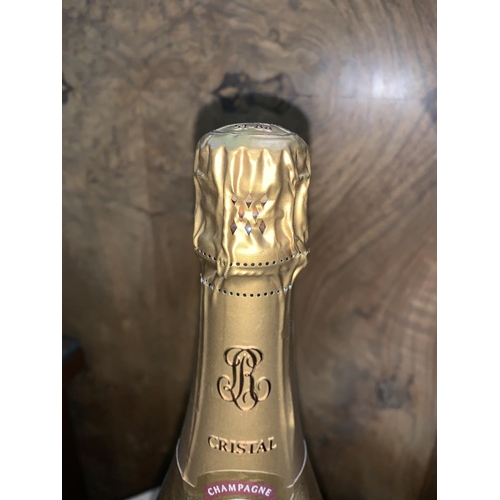 693 - A bottle of 1996 vintage Cristal Champagne Louis Roederer