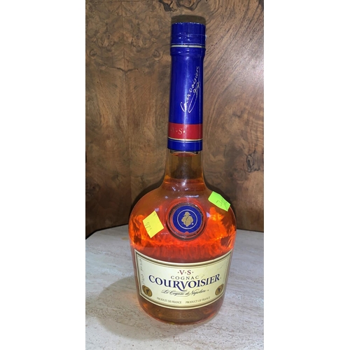 700 - A bottle of COURVOISIER V.S. Napoleon brandy
