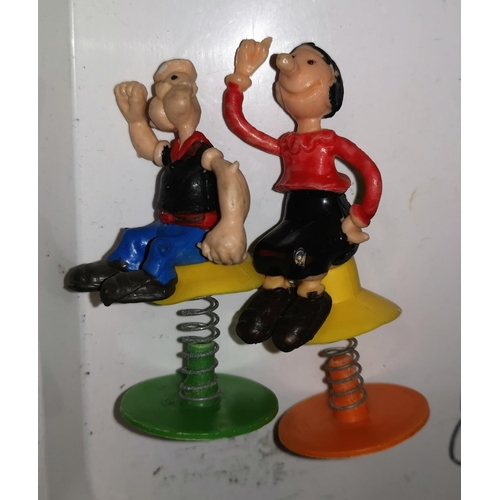 857A - A 1979 Imperial pop up toy of Popeye and another of Oliveo Oyl