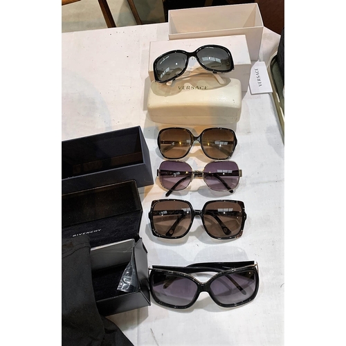 730 - Pair of Versace sunglasses in case; 3 other pairs of sunglasses; a Givenchy pair in box