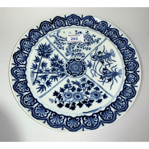 293 - A 19th century Chinese porcelain blue & white plate, the quartered central panel decorated with flow... 